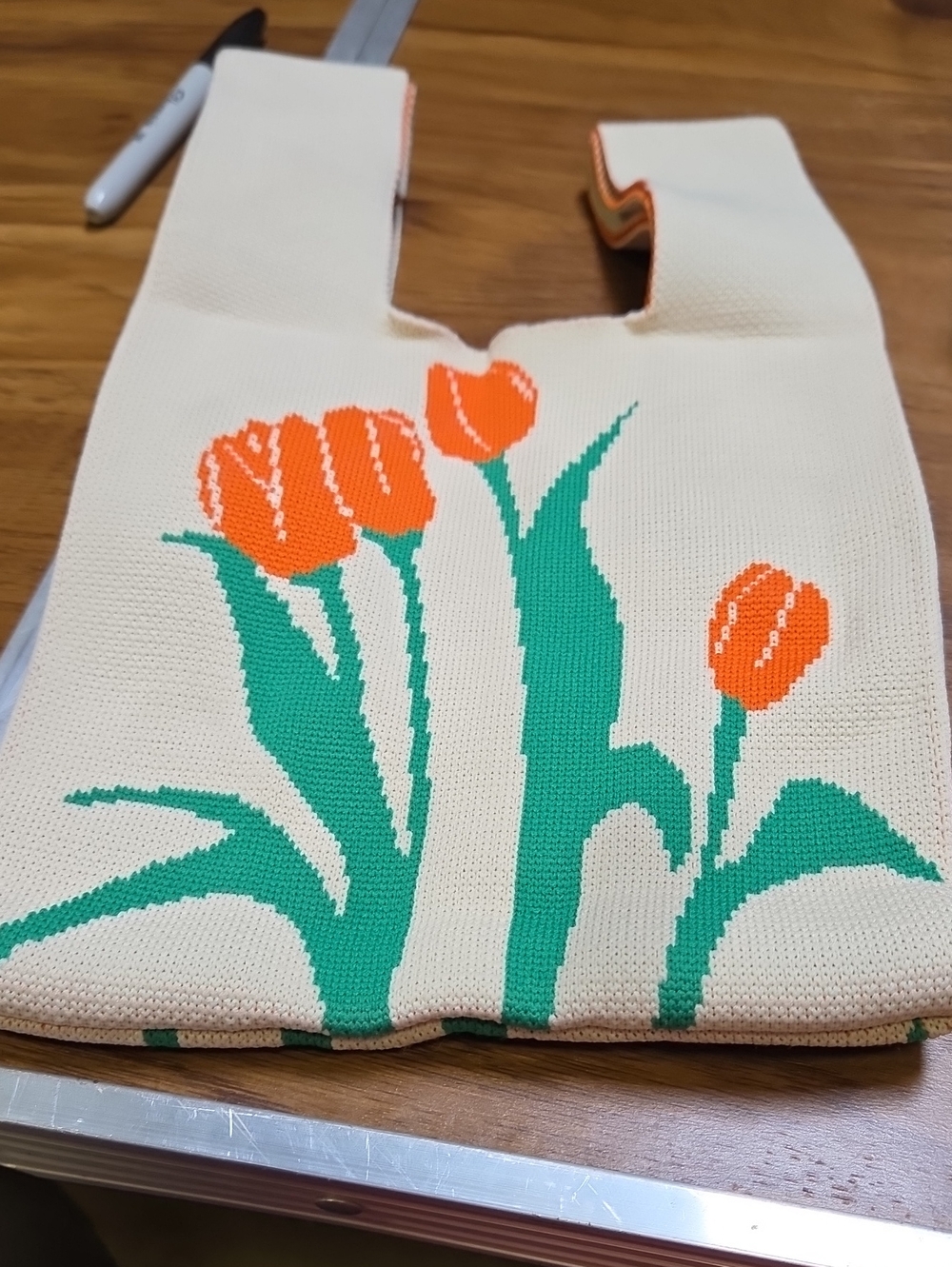 Cream Knit Tulip Tote Bag with Orange and Green Floral Design